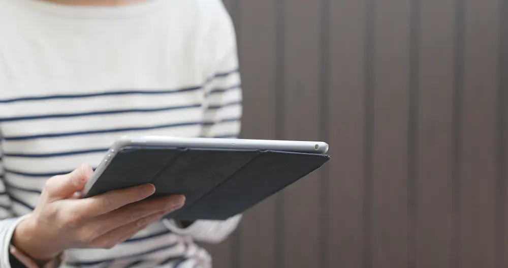 reading news on tablet